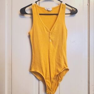 Yellow ribbed body suit